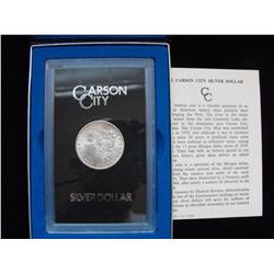 1884 CC CARSON CITY $1 SILVER GSA WITH ORIGINAL PAPERS AND BOX