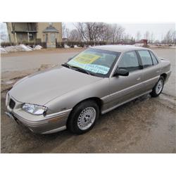 1998 Pontiac Grand Am SE, 4 Door, 6Cyl, Brown, 37,0000 km - Yes the kms are that low - , Saftied