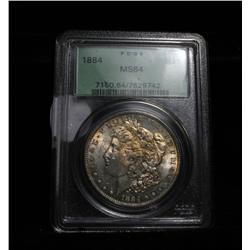 PCGS Rainbow Toned 1884-p Morgan Dollar in an Original Green Holder OGH graded ms64