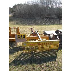 skid loader boom w/pull back rake