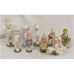9 Antique Bisque Dolls On Coin Stands