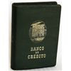 Image 1 : BANCO DE CREDITO, embossed on front. ‘El Horro Crea Riqueza’ on spine. Slot on side for coins, hole 