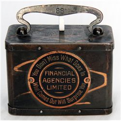 FINANCIAL AGENCIES LIMITED. ‘YOU DON’T MISS WHAT GOES IN..’ A steel satchel bank, with rounded corne