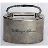 Image 1 : LA BANQUE NATIONALE, engraved on side of bank. An oval satchel bank. Coin slot on top. Handle at top
