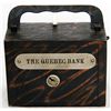Image 1 : THE QUEBEC BANK. A rectangular steel satchel bank, with square corners. Coin slot on right side, wit