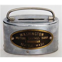 WASHINGTON MUTUAL SAVINGS BANK, SEATTLE, WASH. An oval satchel bank. Coin slot on top. Handle on top