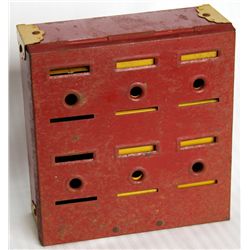 HOME BUDGET BANK. Rectangular shape. 15cm x 15cm x 5cm in height. Red metal. Six slots on top. VG.