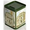 Image 1 : A medium size rectangular shaped can. Coin slot on top. 8cm x 8cm x 10cm. Green and white. EF.