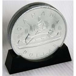 CANADA DOLLAR/VOYAGEUR SILVER DOLLAR. Coin shape/on base. Coin slot on top. 15cm. In height. Silver 