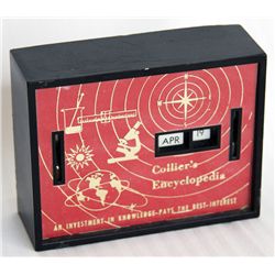 COLLIER’S ENCYCLOPEDIA. A rectangular Coin Calendar bank. Two coin slots in front. Currency slot on 