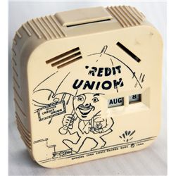 CREDIT UNION-A COIN CALLEDAR BANK. A rectangular Coin Calendar bank. Coin slots on top and front for