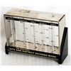 Image 1 : THE MONTREAL CITY AND DISTRICT SAVINGS BANK. A rectangular clear plastic bank with black highlights.