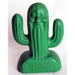 SAGUARO SAVINGS & LOAN ASSOC. A GREEN PLASTIC BANK IN THE SHAPE OF A SAGUARO CACTUS. Coin slot on to