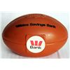 Image 1 : WALES SAVINGS BANK. A Football shaped, tan plastic bank. Coin slot on top. 9cm x 9cm x 14cm. EF.