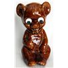 Image 1 : A Brown Ceramic Seated Bear Bank. Coin slot on top. 10cm x 12cm x 19cm. Made in England. VF.