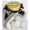 Image 1 : CUSS BANK. A Ceramic bulldog head shaped bank, Slot on top for ‘Temper Charges’. 1cm x 13cm x8cm. Br