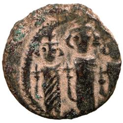 ARAB-BYZANTINE: Three Standing Figures, ca. 685-700, AE fals (2.87g), Baysan