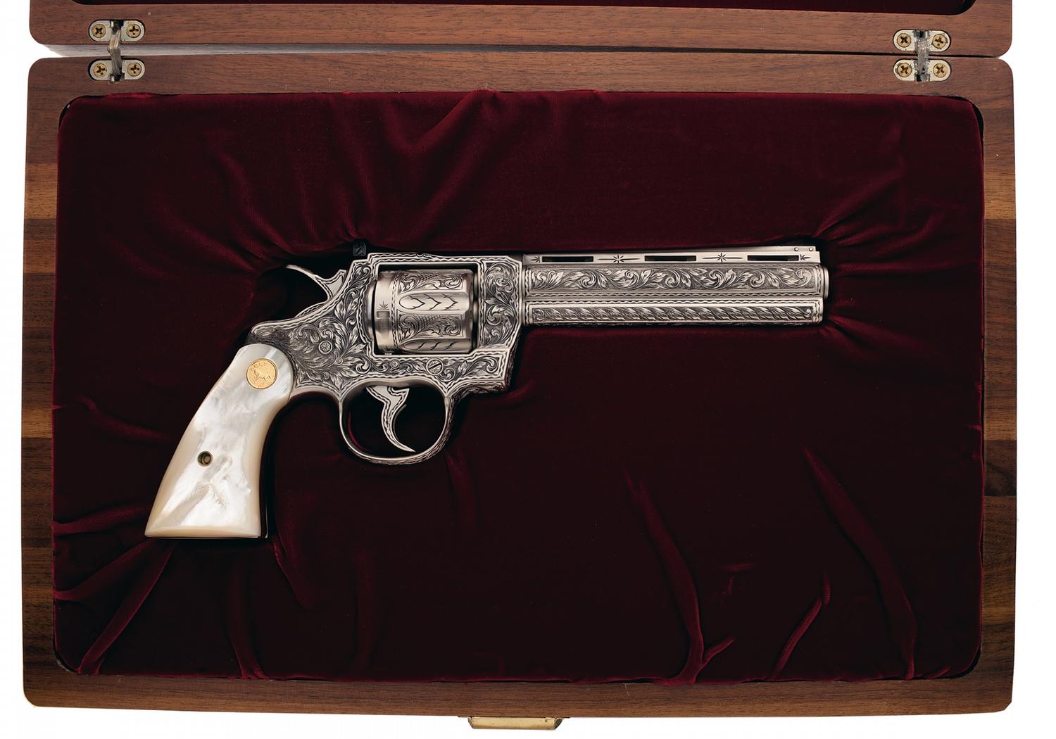 Custom Engraved Colt Python Cased Custom Engraved Colt Python Double Action Revolver with Pearl Grips