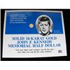 Image 1 : 14 K GOLD KENNEDY MEMORIAL HALF DOLLAR