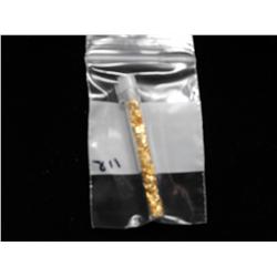 GLASS VIAL OF GOLD FLAKE