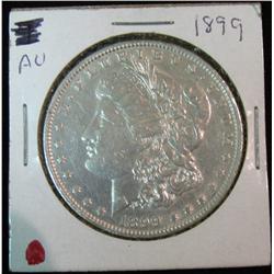 116. 1899 P Silver Morgan Dollar. AU 50.