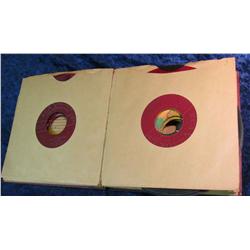 737. 45 RPM Record Album case with a large group of records including