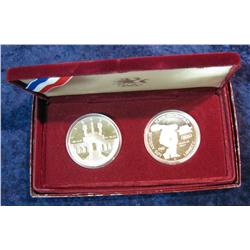 2051. 1983 S & 84 S Proof Silver Olympics Dollars. Original as issued.