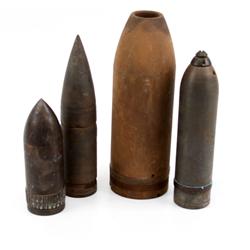 LOT OF FOUR WWI ERA ARTILLERY PROJECTILES