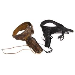 TWO TOOLED LEATHER PISTOL BELTS WITH HOLSTERS