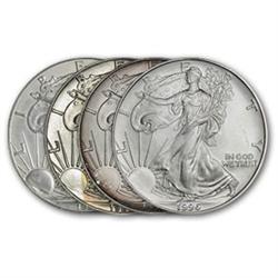 Lot of 4 Assorted Silver Eagles- Average-