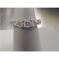 1 Carat Diamond Ring W/3 Center Round Diamonds