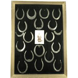 Original wood framed blacksmiths horseshoe display
