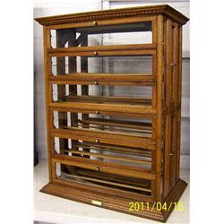 Antique oak ribbon cabinet counter top case