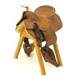 Miniature tooled leather saddle