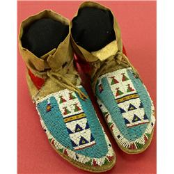 C. 1880--1890's Plains moccasins fully beaded