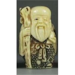 NETSUKE HAND CARVED ORIENTAL FIGURE