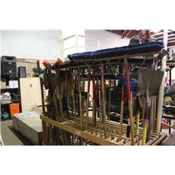 RACK OF BROOMS -  SHOVELS & EQUIPMENT