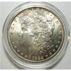 1884CC Morgan $  MS60/64. Nice coin but has a severe bag mark obverse
