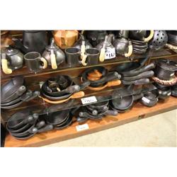 SHELF OF POTTERY COOKWARE