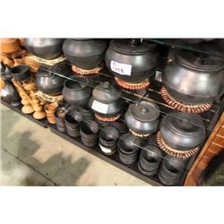 SHELF OF POTTERY COOKING POTS
