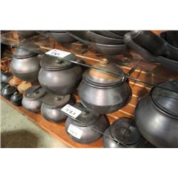 SHELF OF POTTERY COOKWARE