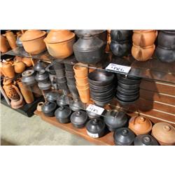 SHELF OF POTTERY CUPS & BOWLS