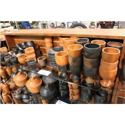 SHELF OF POTTERY CUPS & BOWLS