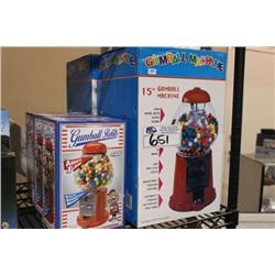 2 GUMBALL MACHINES WITH 3 BOXES OF GUMBALLS