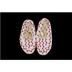 Pair of Children's Sioux Moccasins Fully beaded, red and white in color.Fully beaded, red and white 