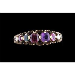 Ladies Mother's Ring Amethyst, garnet, emerald, and other stones, set in 10K yellow gold.Amethyst, g
