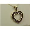 Image 2 : Ladies 10K YG Heart Design Pendant Custom made, channel set with over 1.00 carat in fine color blue 