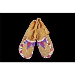 Pair of Northern Paiute Men's Moccasins Decorated with beaded geometric designs, Circa 1930s.Decorat