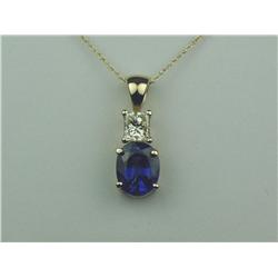 Spectacular 14K WG Ladies Handmade Pendant Set with a center fine oval cobalt sapphire weighing 2.47