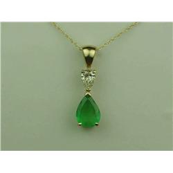 Very Fine 14K YG Ladies Handmade Pendant Set with a center pear shape fern green Emerald weighing ap